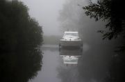 boat in the mist 1